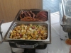 Potato hash, sausage links, bacon and ham
