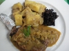 Grilled pork chop, warm german potato salad, braised red cabbage
