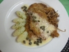 Pan-fried snitzle, tourne pommes vapeur, lemon caper pan reduction sauce, fried onions