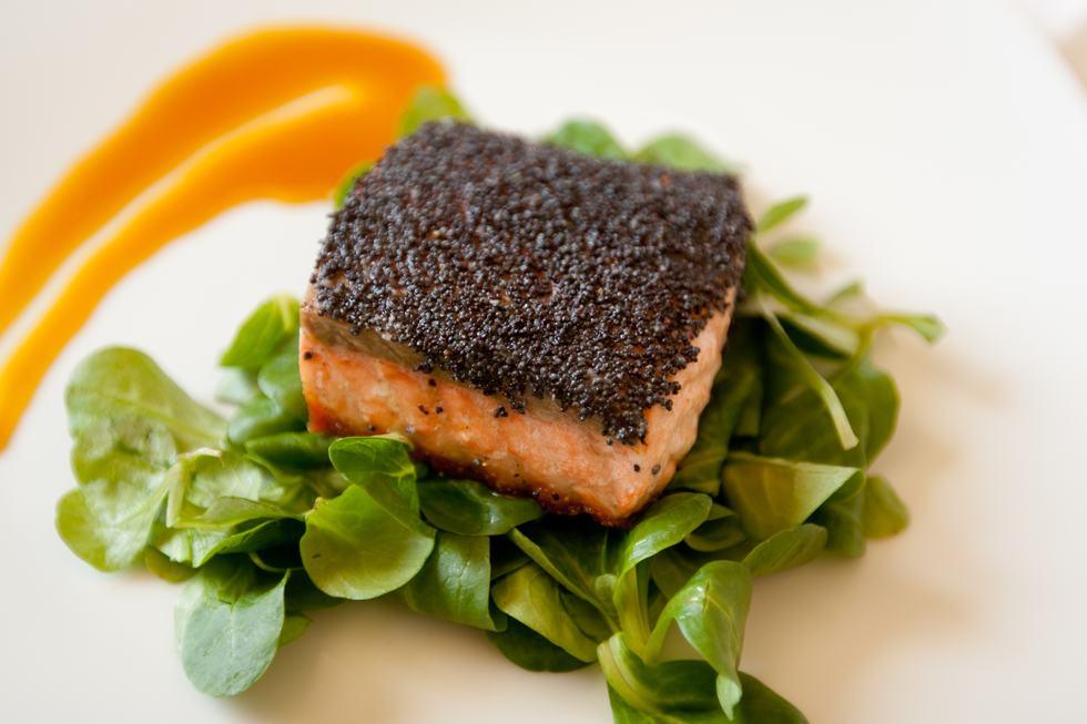 Poppy-crusted salmon on watercress
