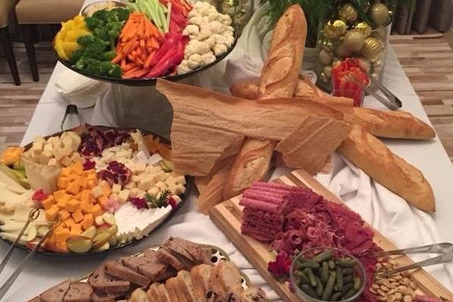 A grazing table laid out for a standing party