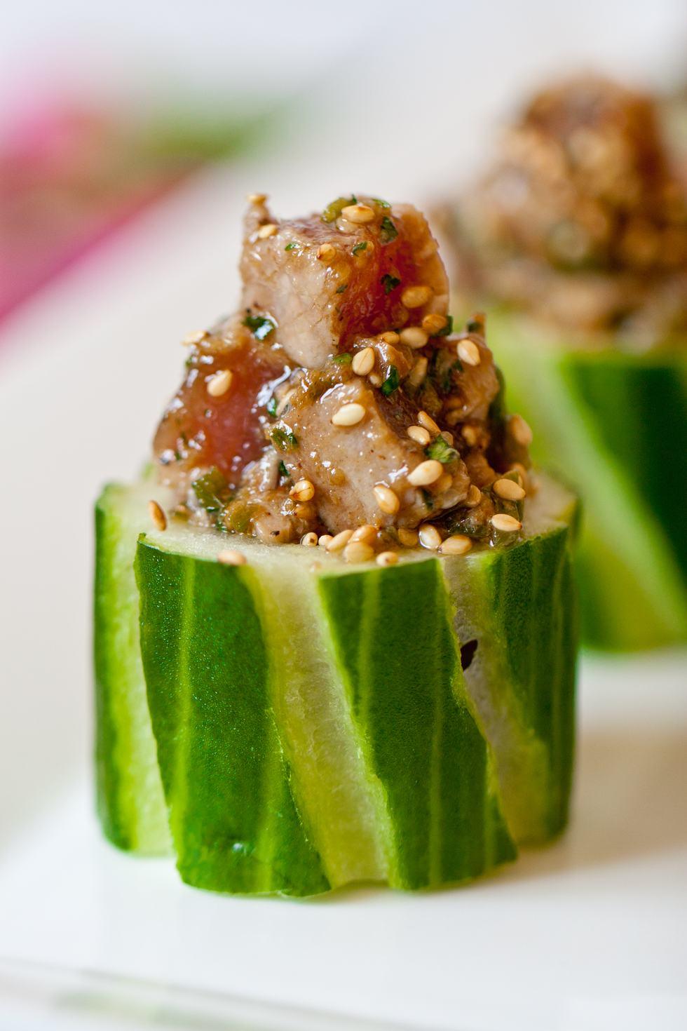 Tuna tartare served in a cucumber cup